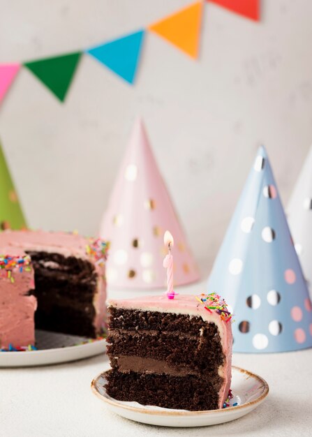 Assortment with slice of cake and ornaments