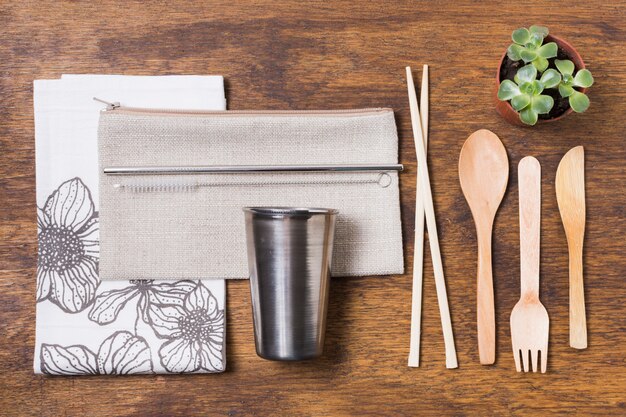 Assortment of zero waste products on wooden background