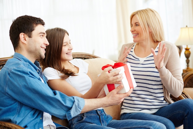 Astonished woman with her gift