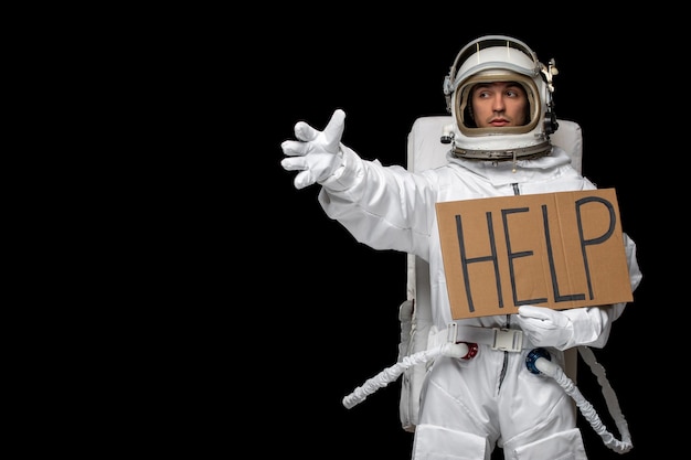 Free photo astronaut day spaceman in galaxy moon space suit helmet asking for help scared