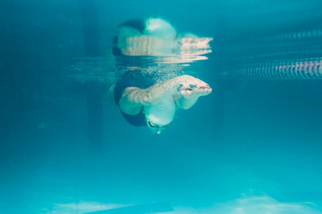 Athlete diving underwater