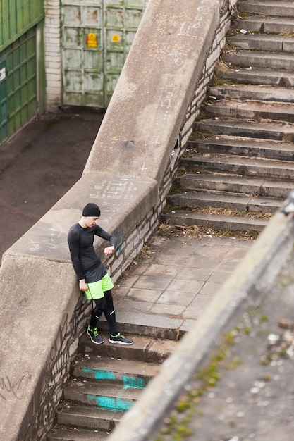 Athlete looking at watch