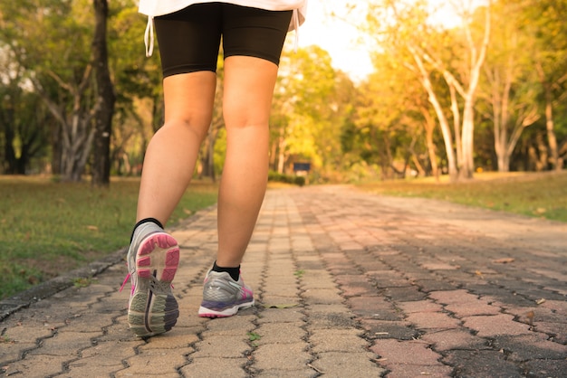 athlete park outside female runner