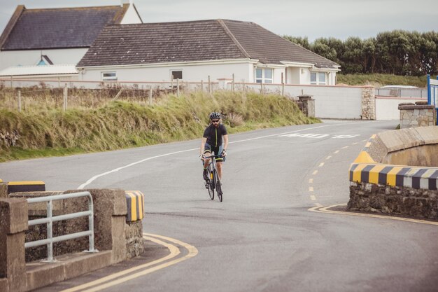 Athlete riding a bicycle