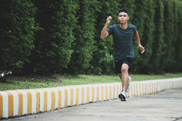 Free photo athlete standing on an all-weather running track