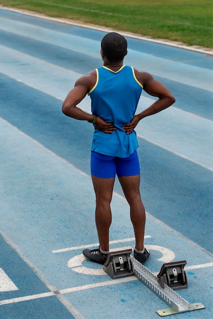 Athlete on the starting line at the stadium