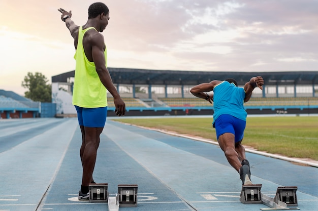 Athletes on the starting line at the stadium