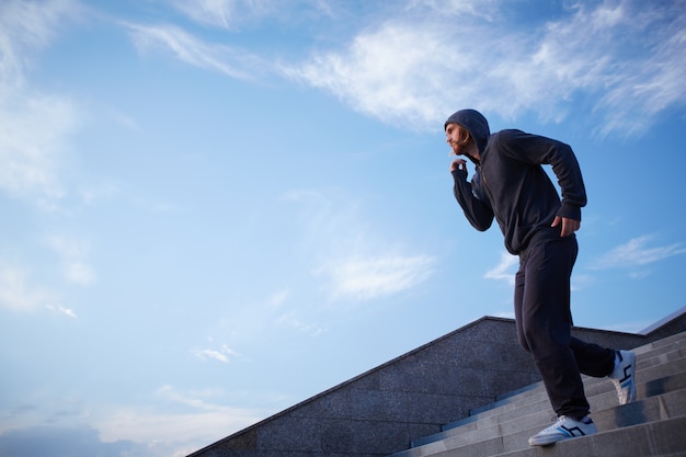 Free photo athletic man jogging outdoors