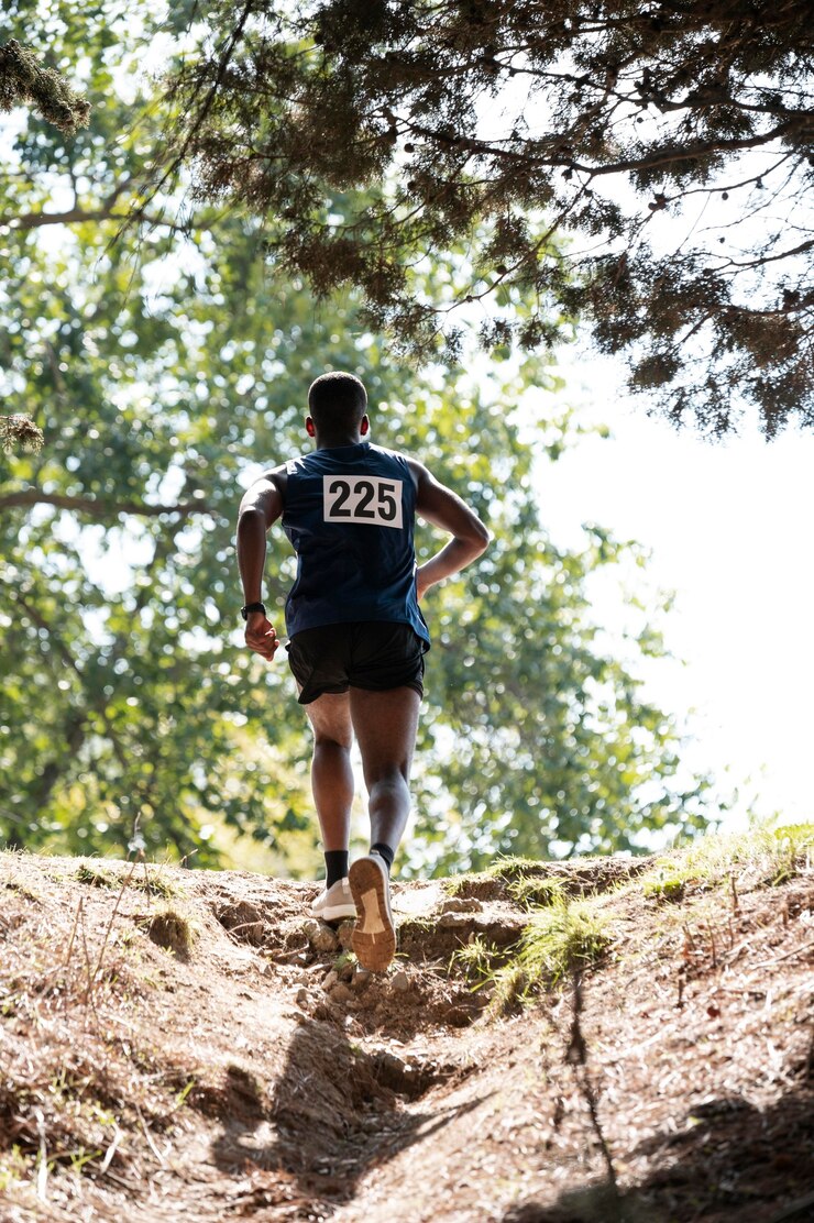 Free Photo athletic man participating in a cross country