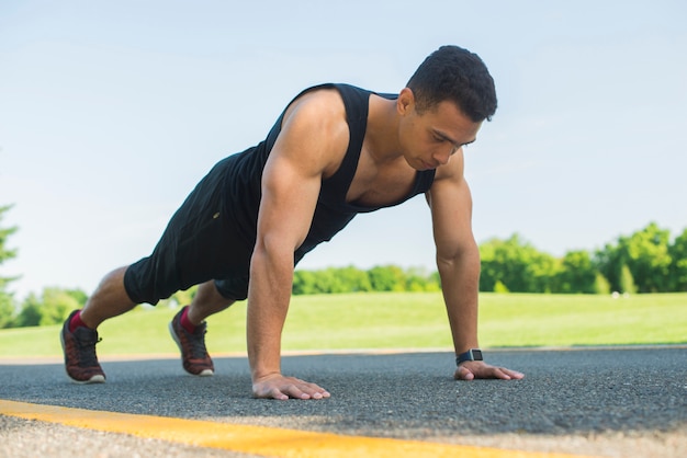 Athletic man practicing sport outdoor