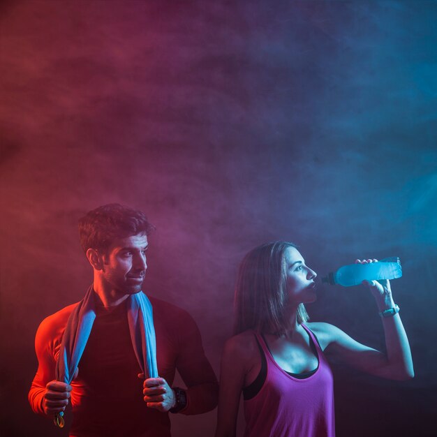 Athletic sportspeople posing in studio