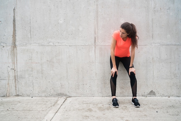 Athletic woman on a break from training