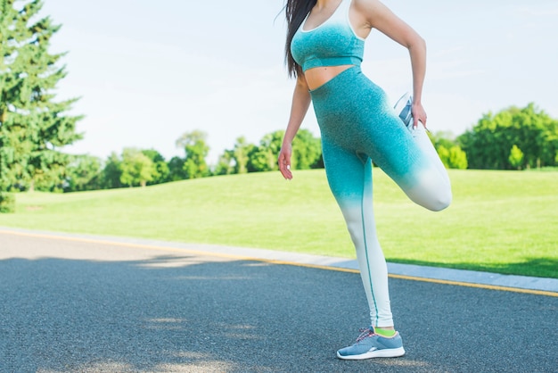 Athletic woman practicing sport outdoor