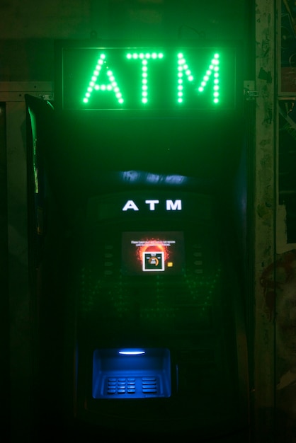 Free photo atm neon lights for changing money sign