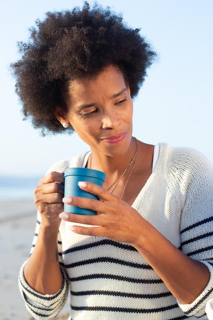 Attractive African American mother on picnic