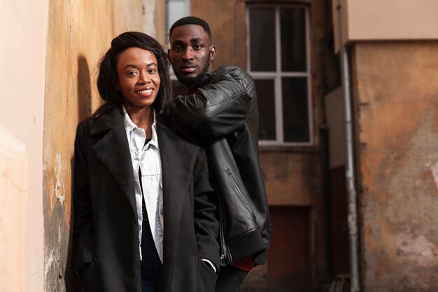 Attractive afroamerican couple posing medium shot