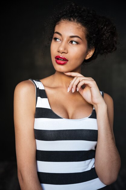 Attractive american young woman with red lips