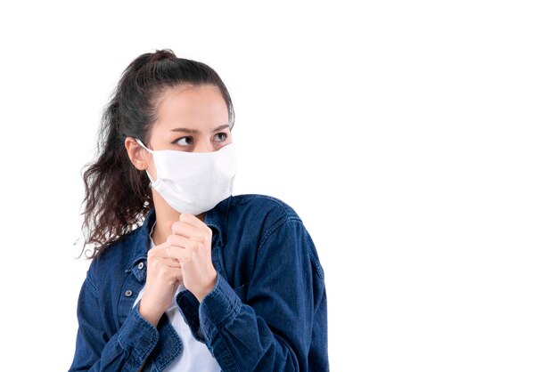 Attractive asian woman with mask covid19 coronavirus protection fear and scare of outbreak spread of flu virus isplate white background