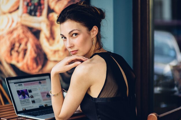 Attractive business woman working at his laptop