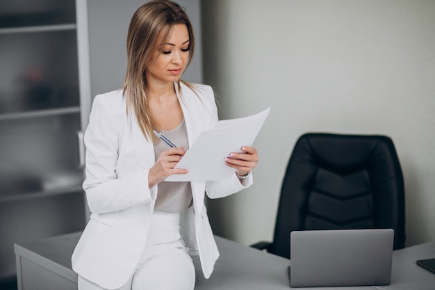 Attractive business woman working in office