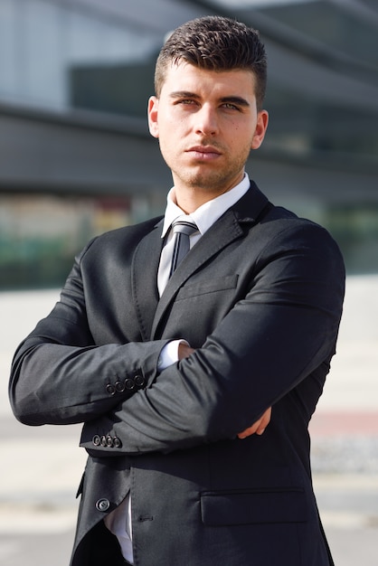 Attractive businessman with crossed arms