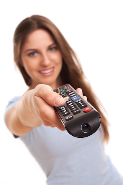 Attractive caucasian woman with  TV remote