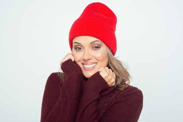 Attractive content woman in red hat