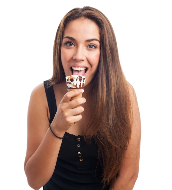 Attractive girl licking ice cream