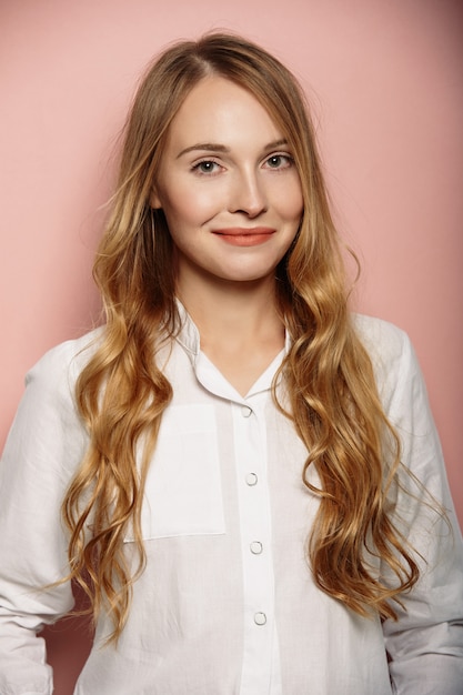 Attractive girl portrait in a white shirt