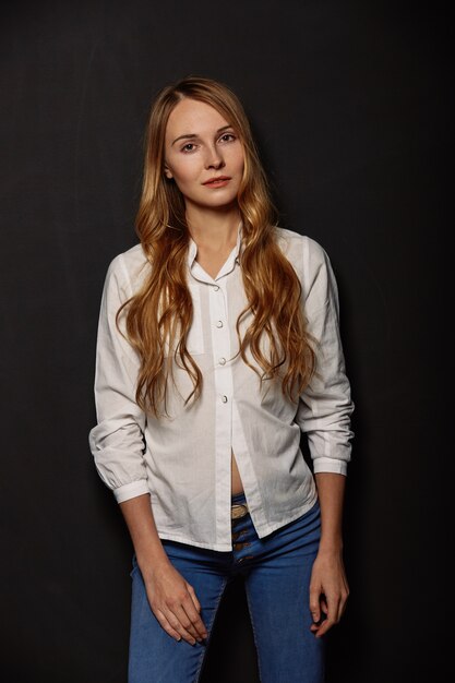 Attractive girl portrait in a white shirt