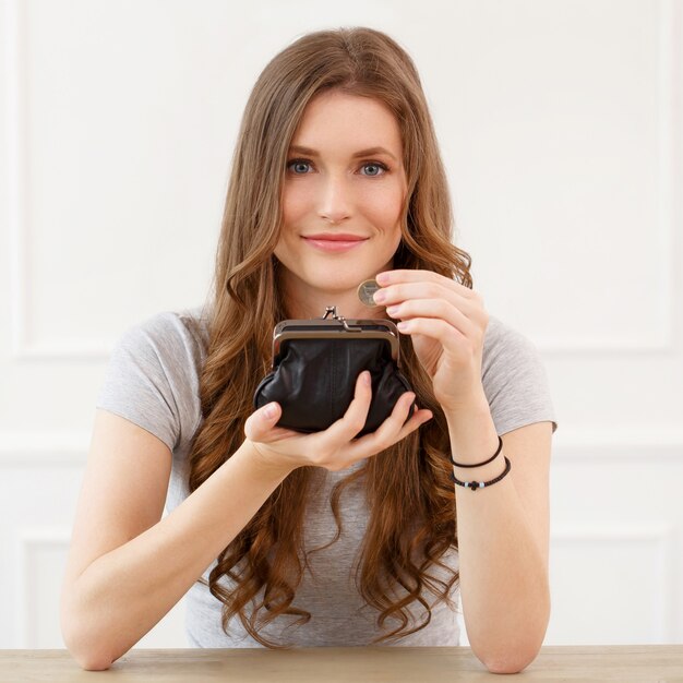 Attractive girl with wallet