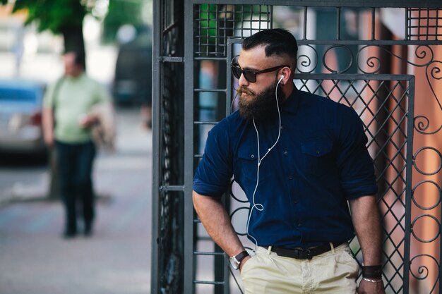 Attractive guy with hand in pocket