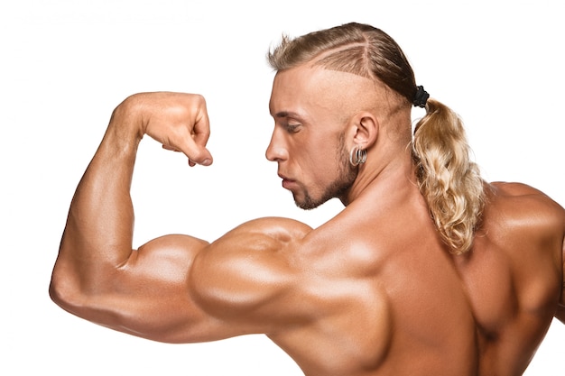 Attractive male body builder on white background