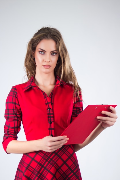 Attractive modern young Business woman with clipboard