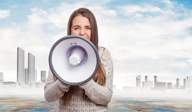 Attractive teenager with megaphone