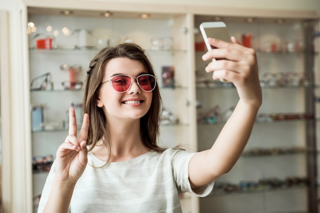 Attractive woman on appointment in eye specialist office