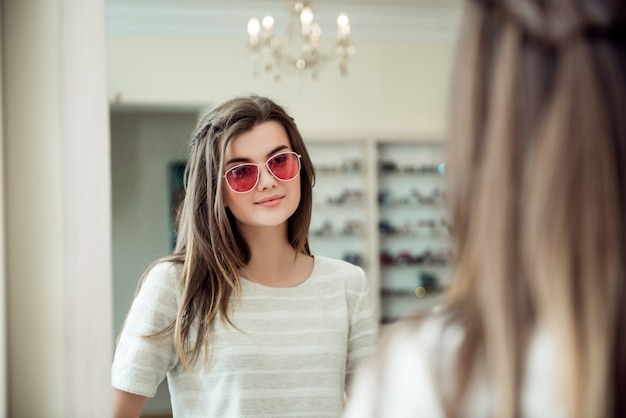 Attractive woman on appointment in eye specialist office