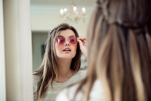 Attractive woman on appointment in eye specialist office