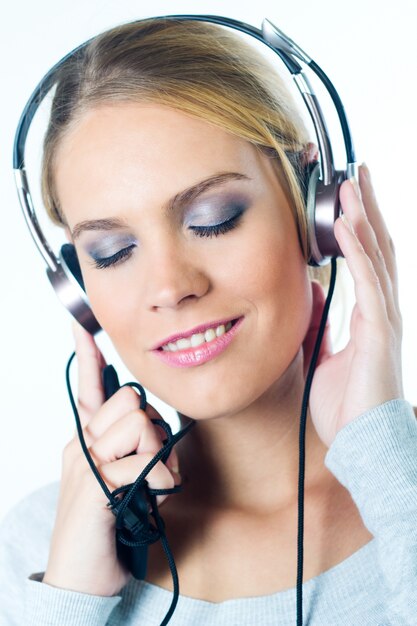 Attractive woman enjoying music