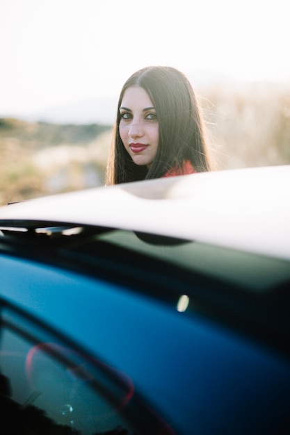 Attractive woman near car