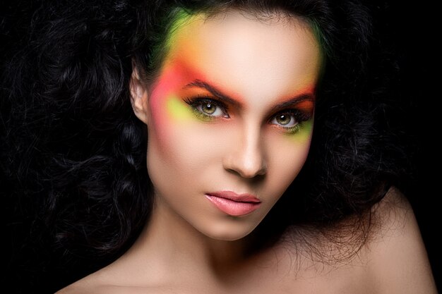 Attractive woman with colored make-up