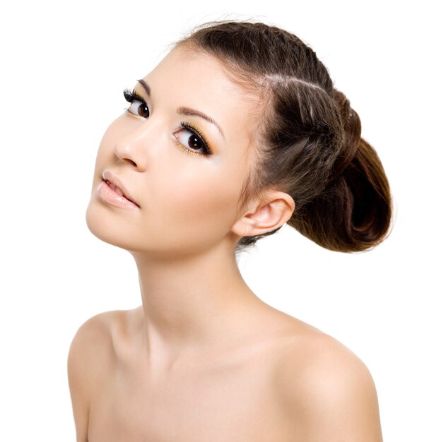 Attractive woman with hairstyle of pigtail. On white space