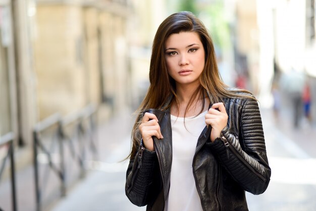 Attractive woman with leather jacket