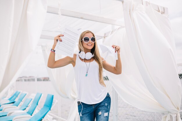 Attractive woman with music sheets