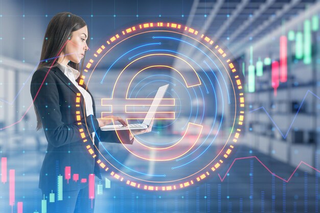 Free photo attractive young european businesswoman using laptop with digital round euro sign on blurry office interior background online banking cryptocurrency and finance concept double exposure