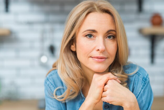 An attractive young woman looking at camera