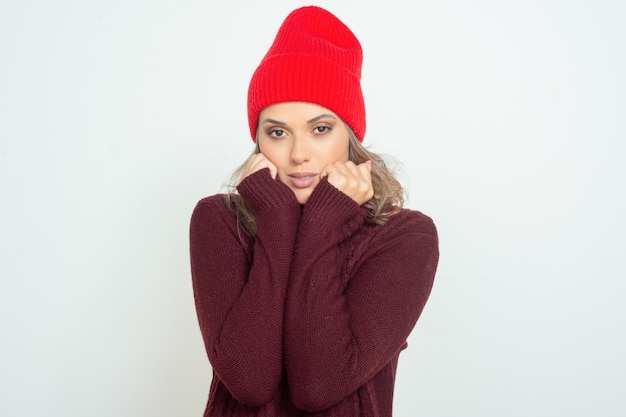 Attractive young woman in red hat