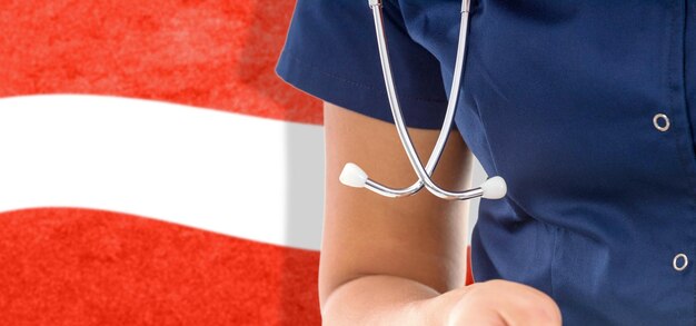 Austria flag female doctor with stethoscope, national healthcare system