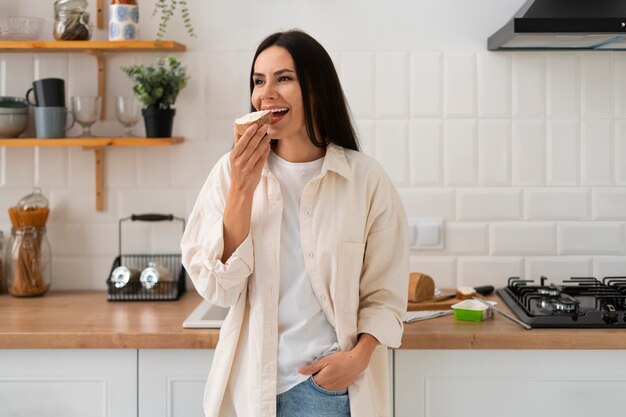 Authentic person eating fresh cheese