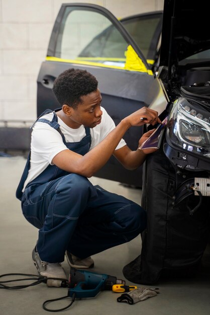 Auto service salon doign car wrapping